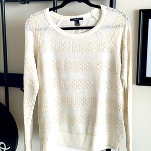 White and gold sweater